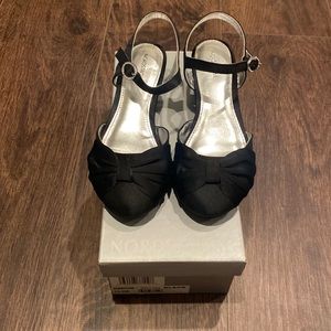 black satin dress shoe, with little heel